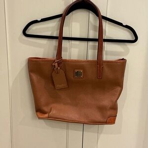 Dooney & Bourke Pebbled brown leather tote.